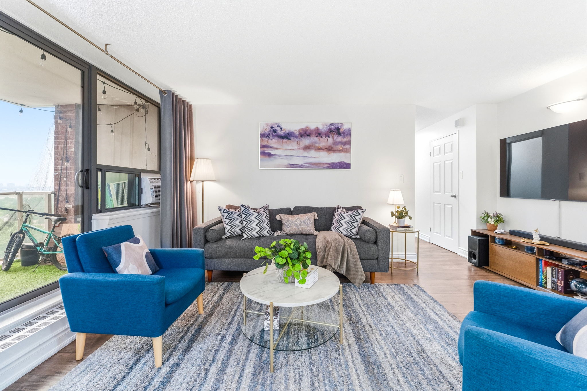 Living room with walkout to balcony