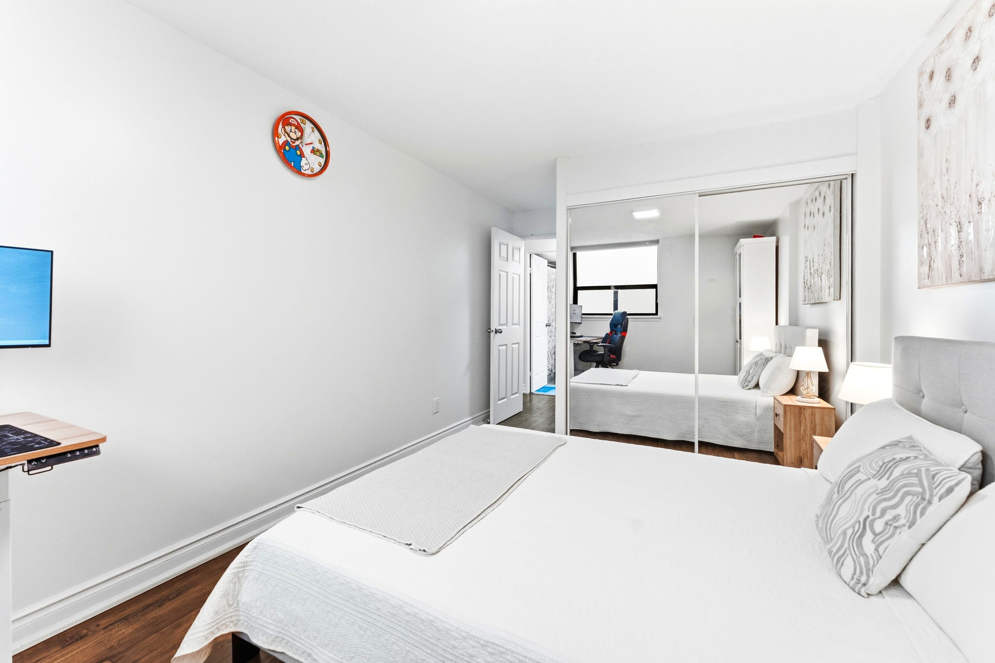 Bedroom with mirrored closet